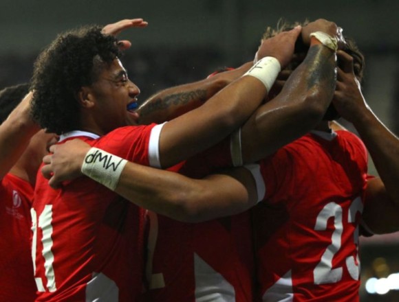 Tonga end World Cup on high with seven-try win over Romania